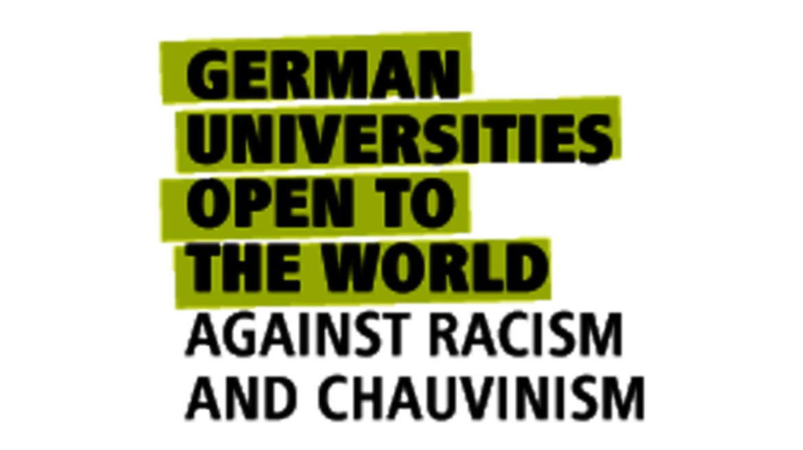 "German Universities Open to the World Against Racism and Chauvinism." The image conveys a message of inclusivity and opposition to racism and chauvinism in German universities, emphasizing their openness to the world.