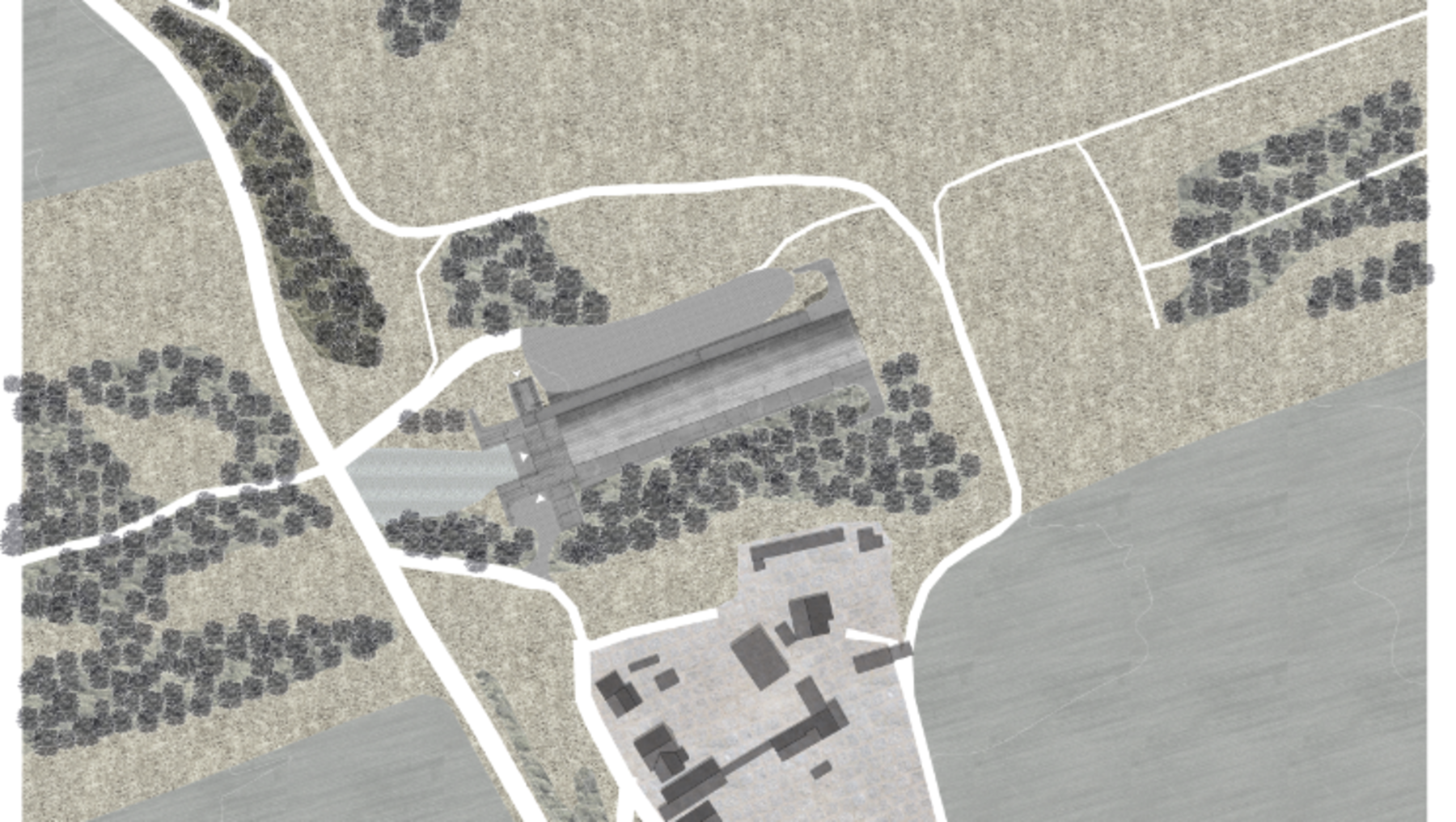 Luftbild eines Gebäudekomplexes mit zentralem, langgestrecktem Hauptgebäude und mehreren kleineren Anbauten, umgeben von zahlreichen Bäumen und Grünflächen. Im Hintergrund Feldwege und offene Ackerflächen.