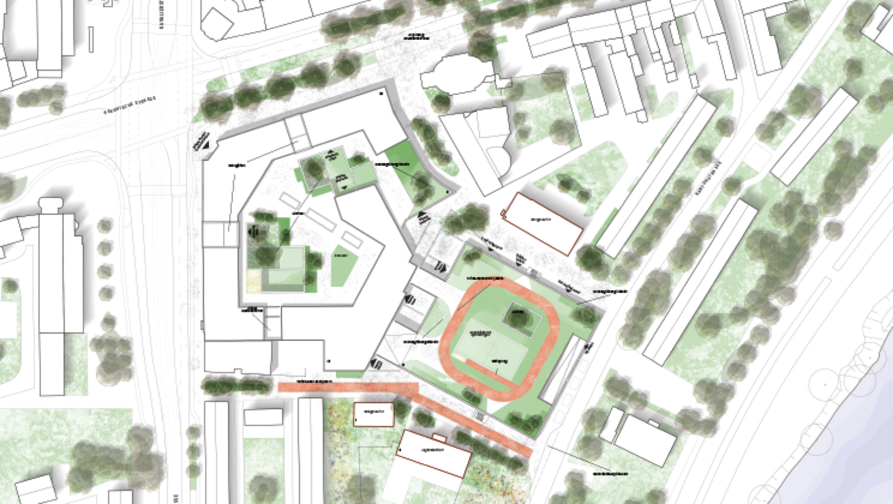 Stadtplanausschnitt mit zentralem Sportplatz in ovaler Form, umgeben von Wegen und Grünflächen. Im Norden führt eine markierte Straße vorbei, im Süden grenzen Gebäude und weitere Grünzonen an.