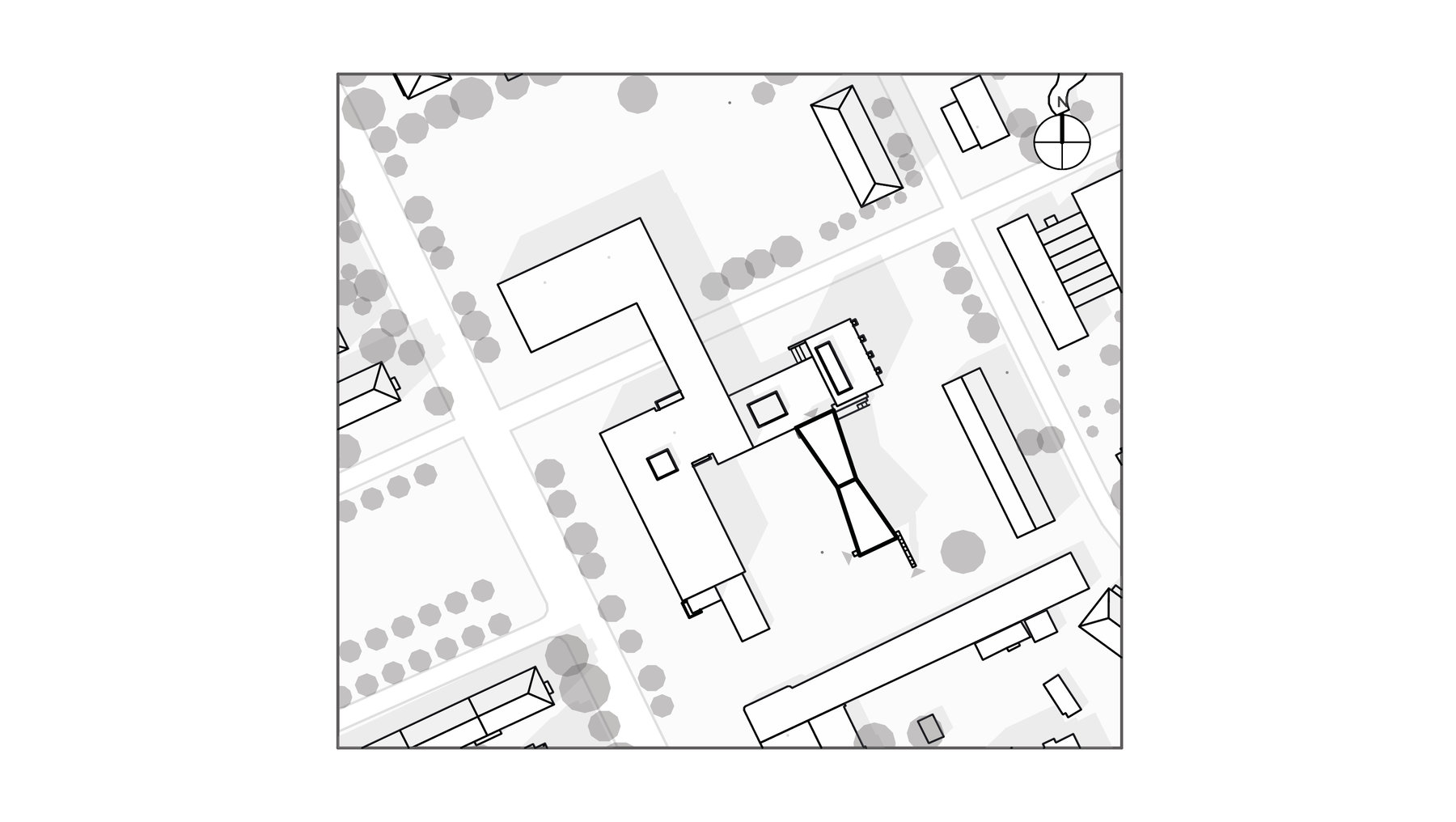 Stadtplanausschnitt mit Gebäuden, Straßen und Grünflächen. Im Zentrum ein zentraler Platz mit markanten Gebäuden, umgeben von kleineren Häusern und Bäumen als Punkte dargestellt. Straßen verlaufen in einem Rastermuster.