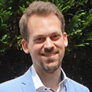 Porträtfoto von Dr. Niels Hellwig