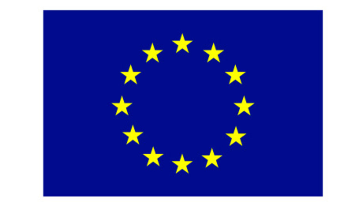 The image shows the flag of the European Union. It features a blue background with a circle of twelve gold stars. The stars symbolize unity, harmony, and solidarity among the peoples of Europe.
